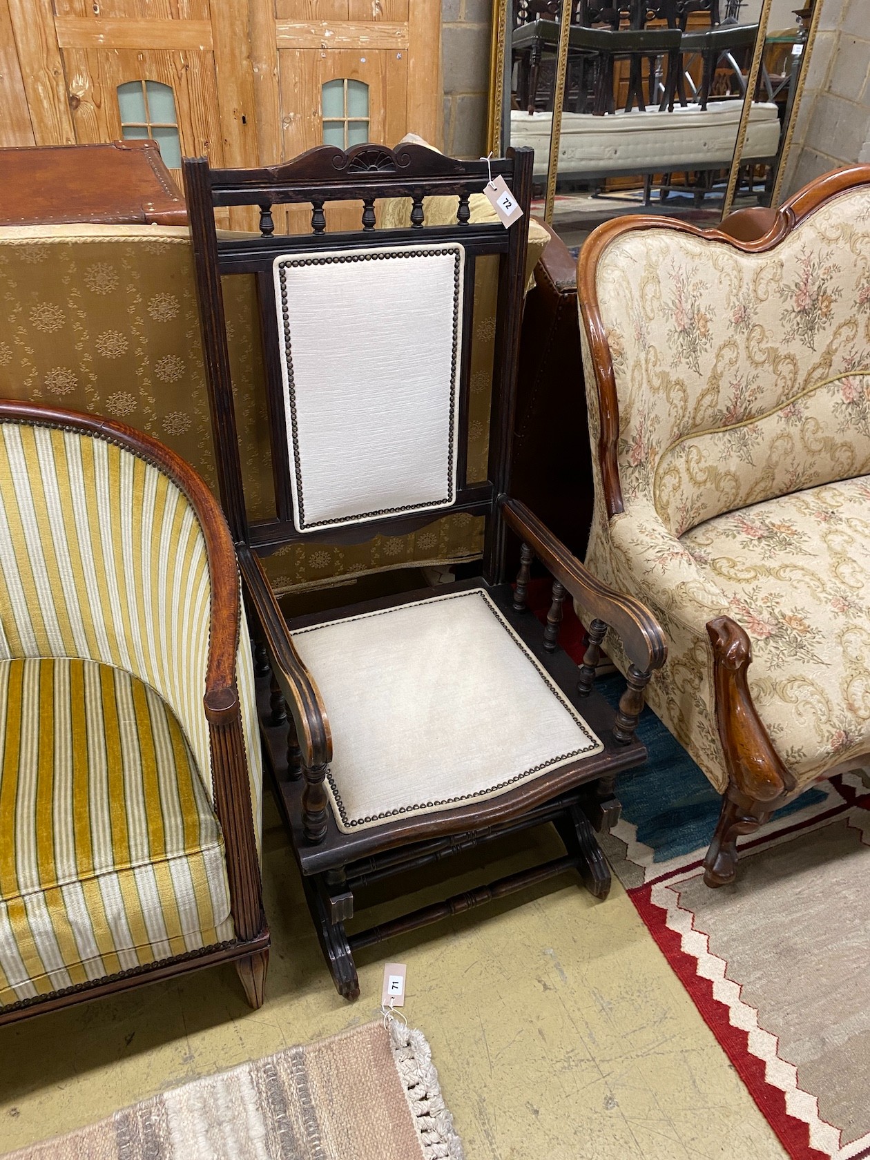 A late 19th century American rocking chair, width 56cm, depth 50cm, height 109cm